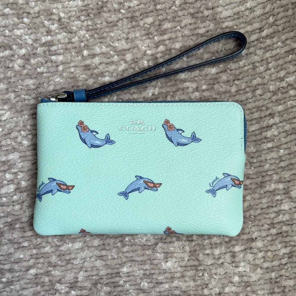 Coach Wristlet with Dolphin Print